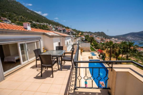 Delightful Flat Close to Kalkan Public Beach with Shared Pool and Terrace with a Stunning View in Kalkan